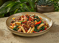 Image of Penne mit Gemüse und Speck