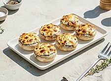 Image of Mit Käse überbackene Champignons