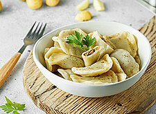 Image of Schlutzkrapfen mit Sauerkraut und Pilzen
