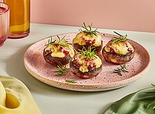 Image of Mit Käse überbackene Champignons